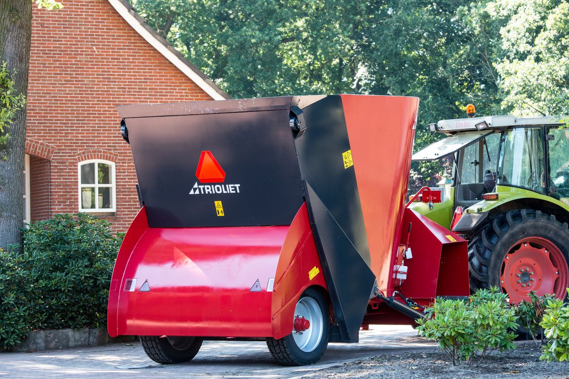 With-the-self-loading-feed-mixer-wagon-one-can-tip-the-feed-into-the-mixing-tub